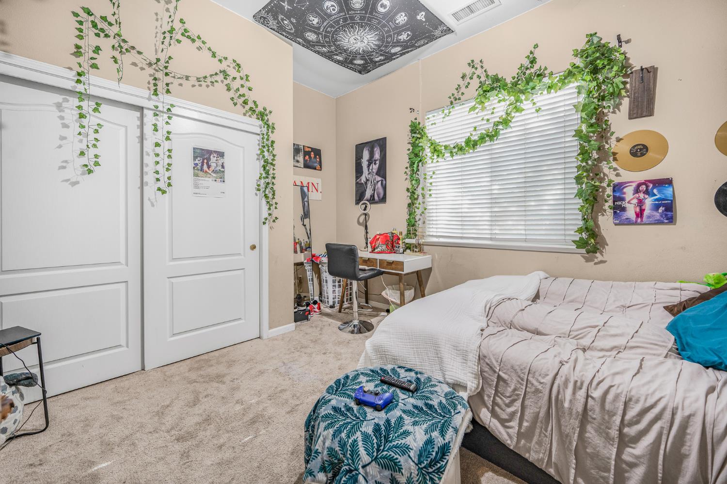 677 West Omaha Avenue Clovis, CA 93619 - Photo 26 of 35 a bedroom with a bed and a table