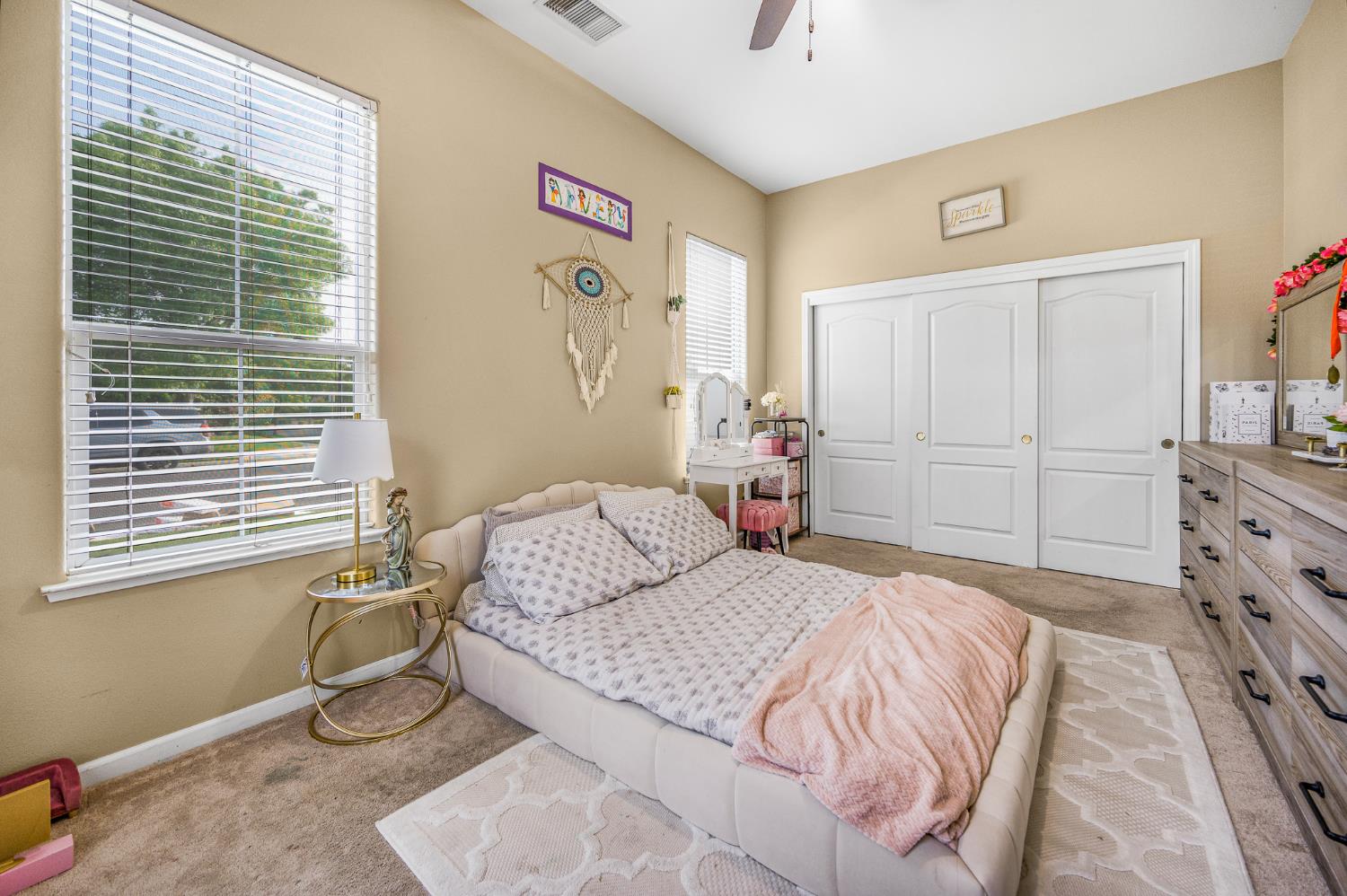 677 West Omaha Avenue Clovis, CA 93619 - Photo 27 of 35 a bedroom with a bed and a closet
