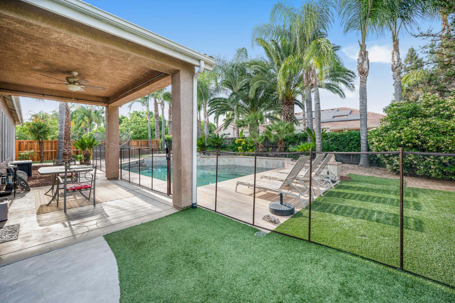 677 West Omaha Avenue Clovis, CA 93619 - Photo 28 of 35 a view of a garden with a patio