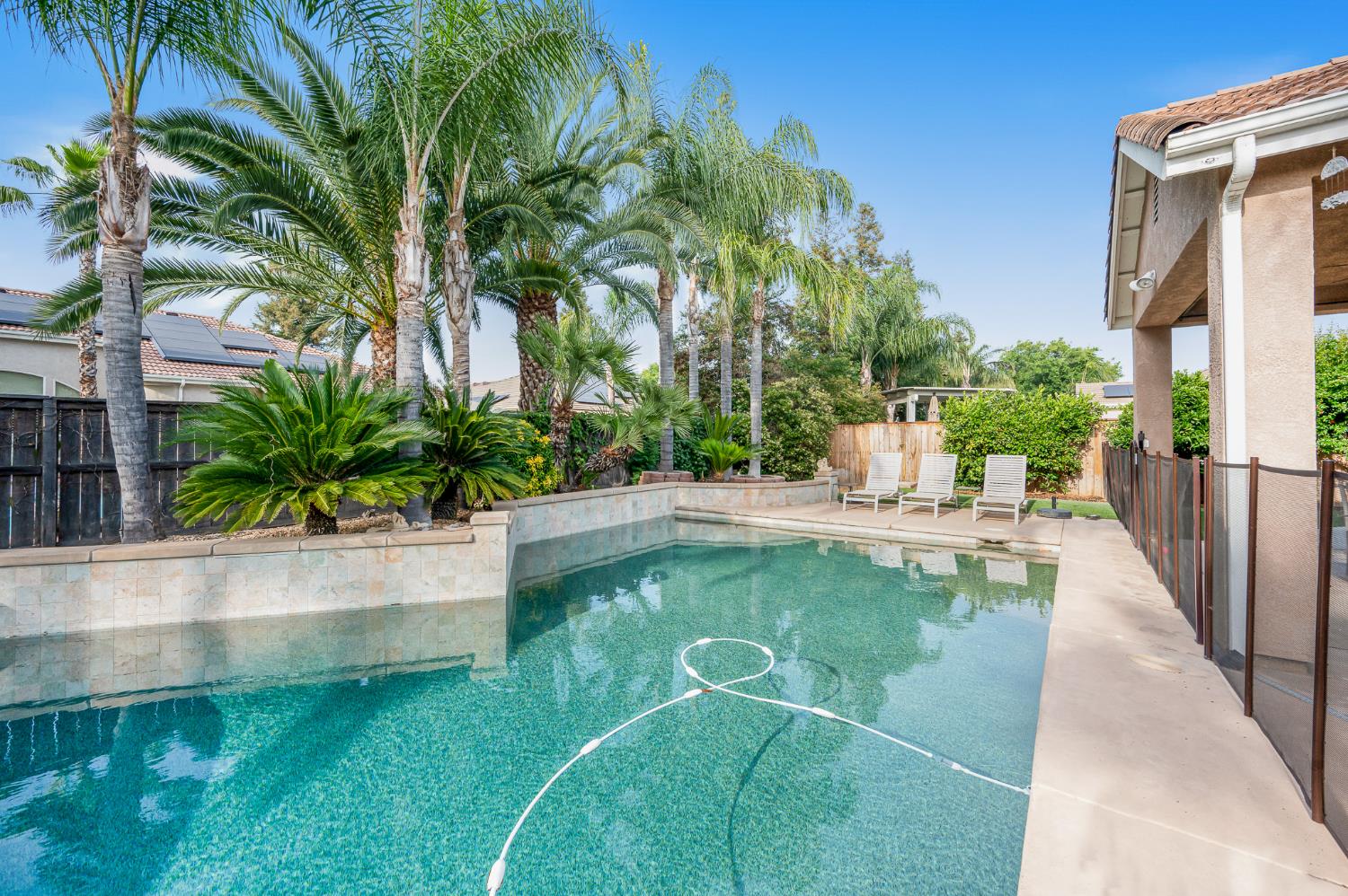 677 West Omaha Avenue Clovis, CA 93619 - Photo 31 of 35 a view of swimming pool with a patio