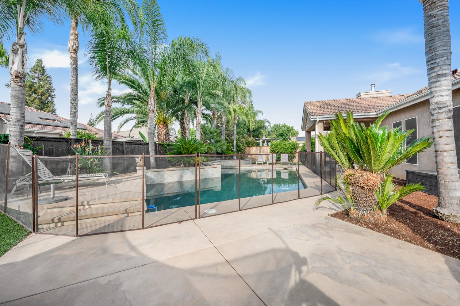 677 West Omaha Avenue Clovis, CA 93619 - Photo 33 of 35 a view of a backyard with a patio