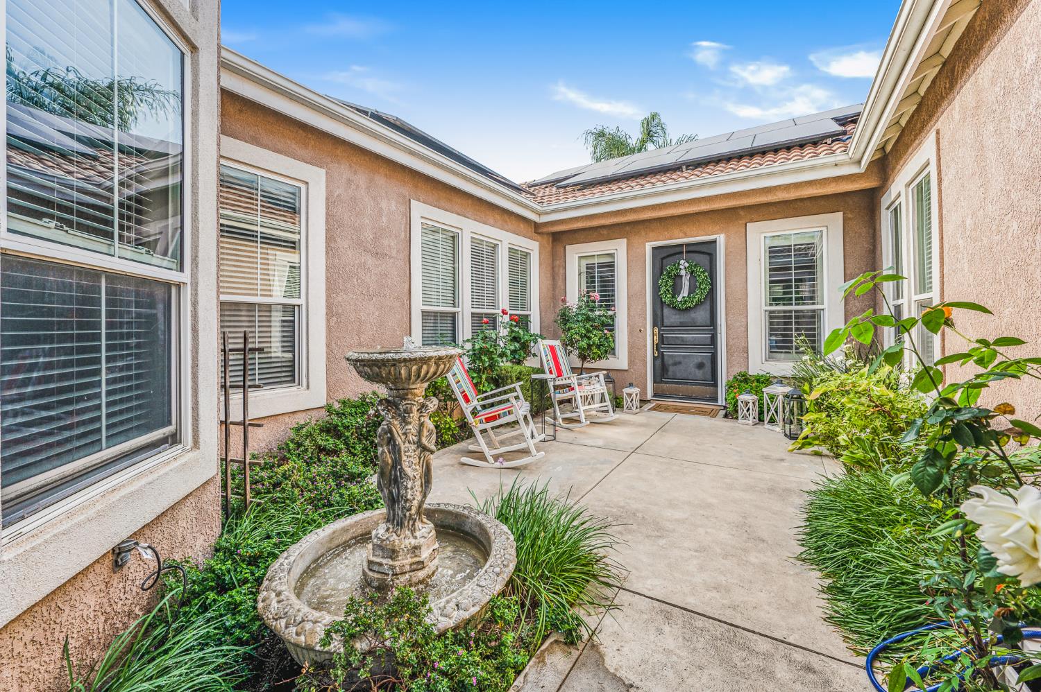 677 West Omaha Avenue Clovis, CA 93619 - Photo 5 of 35 a house view with a outdoor space
