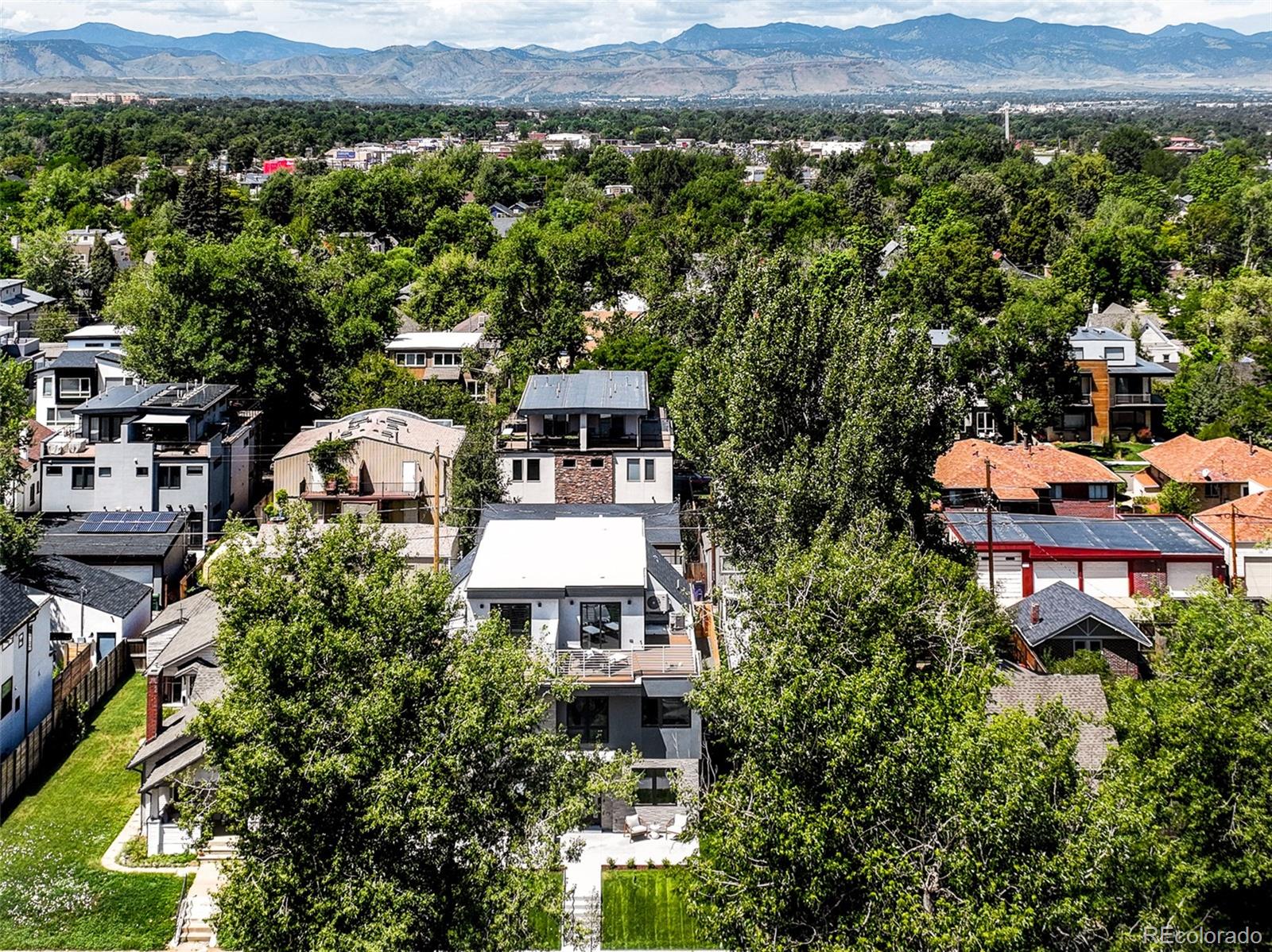 4461 Utica Street Denver, CO 80212 - Photo 40 of 40 an aerial view of a house with a yard and a large tree