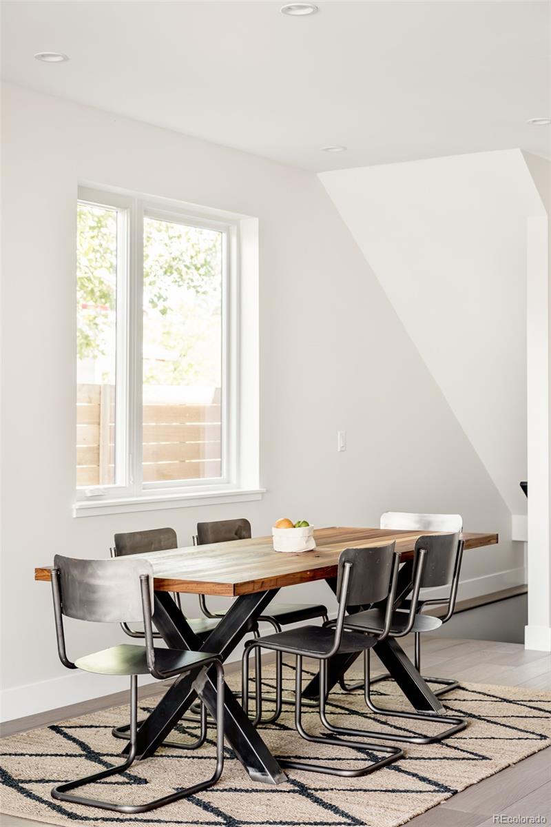 4461 Utica Street Denver, CO 80212 - Photo 7 of 40 a view of a workspace with a table and chair