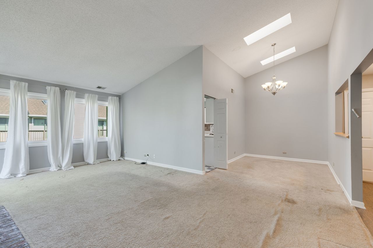 938 Hidden Lake Drive, Unit 938 Buffalo Grove, IL 60089 - Photo 5 of 16 a view of an empty room