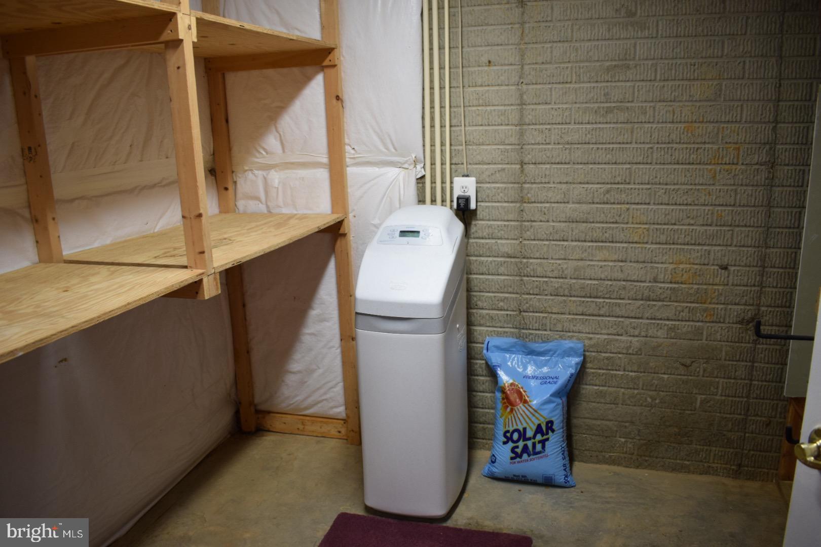 121 Carolstowne Road Reisterstown, MD 21136 - Photo 29 of 34 WATER SOFTENER SYSTEM IN THE LAUNDRY ROOM