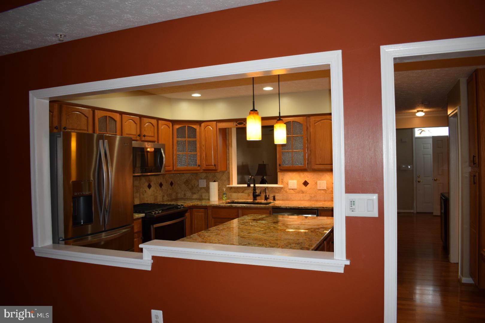 121 Carolstowne Road Reisterstown, MD 21136 - Photo 5 of 34 VIEW THROUGH WINDOW WALL TO THE KITCHEN