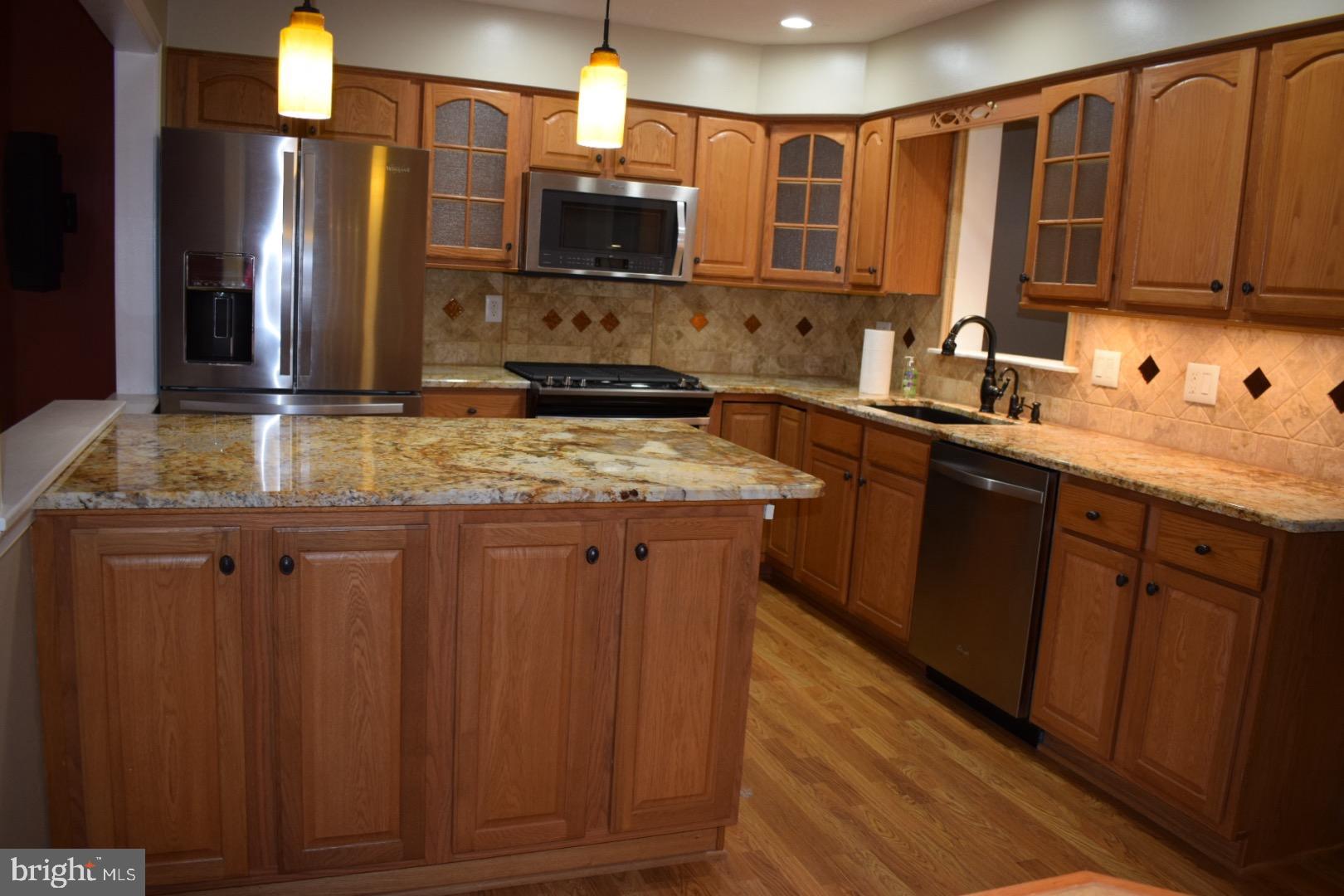 121 Carolstowne Road Reisterstown, MD 21136 - Photo 7 of 34 GRANITE COUNTERTOPS AND STAINLESS STEEL APPLIANCES