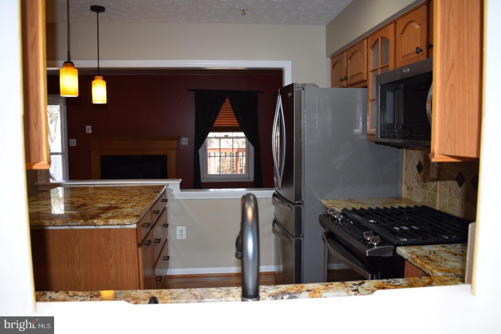 121 Carolstowne Road Reisterstown, MD 21136 - Photo 8 of 34 KITCHEN VIEW TO FAMILY ROOM