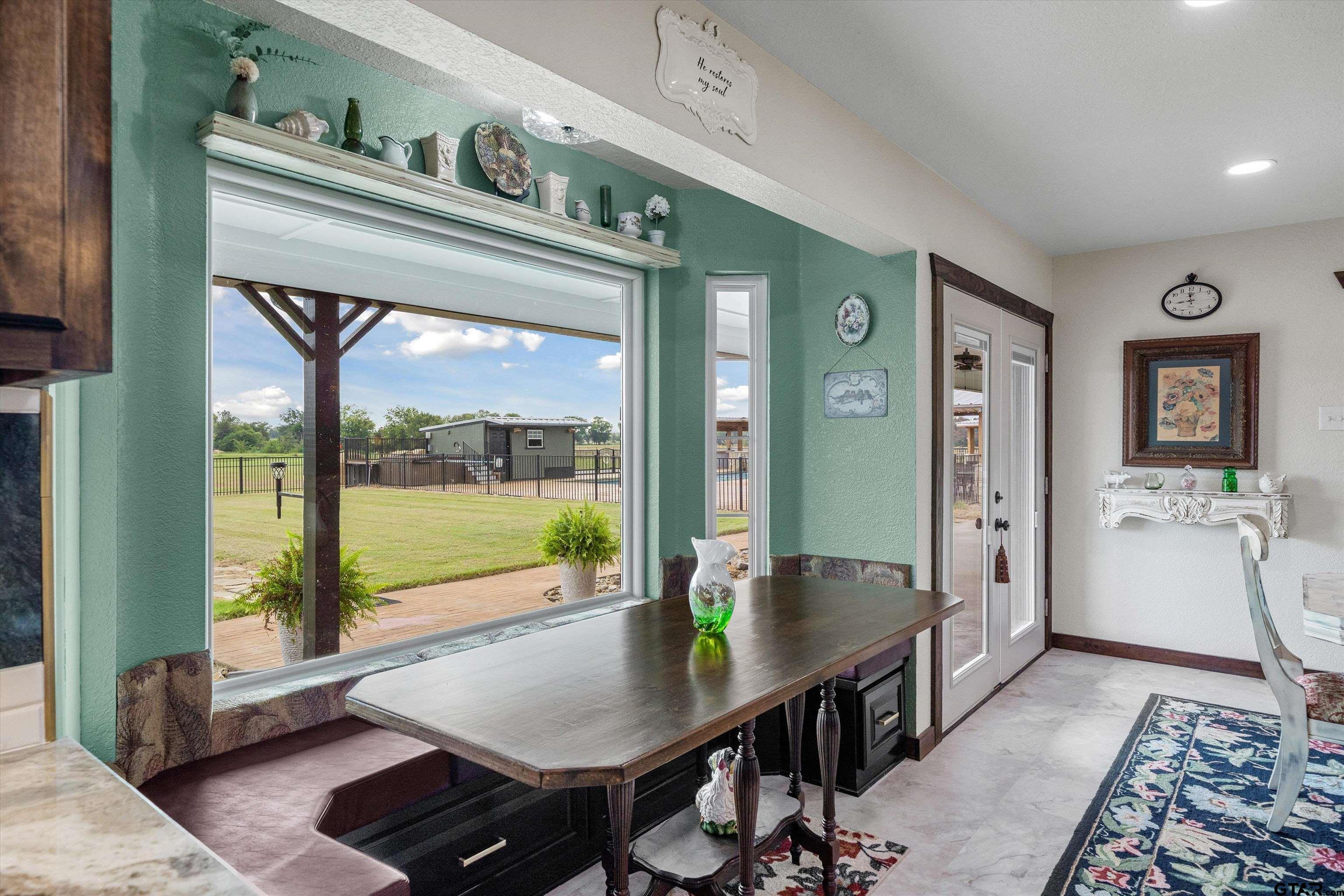 733 Rains County Road 1430 Point, TX 75472 - Photo 15 of 48 a living room with furniture and a large window