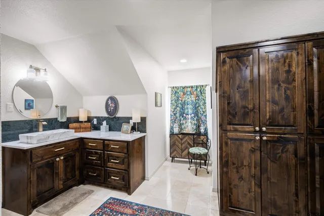 a view of a kitchen counter space and a window