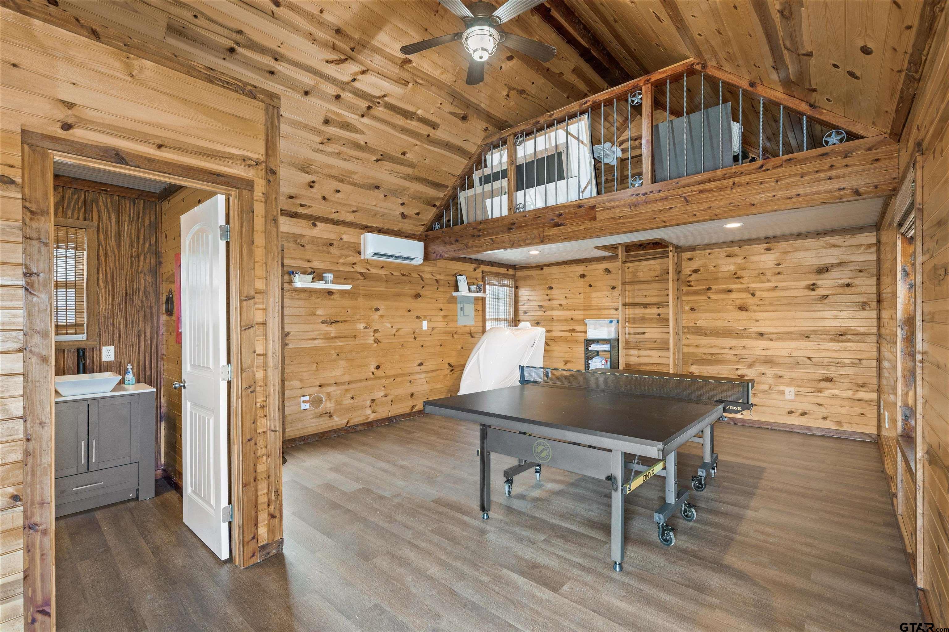 733 Rains County Road 1430 Point, TX 75472 - Photo 36 of 48 a view of a room with wooden floor and windows
