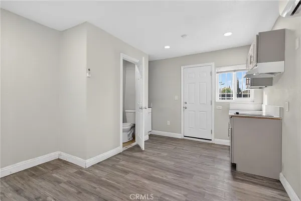 a view of kitchen with wooden floor
