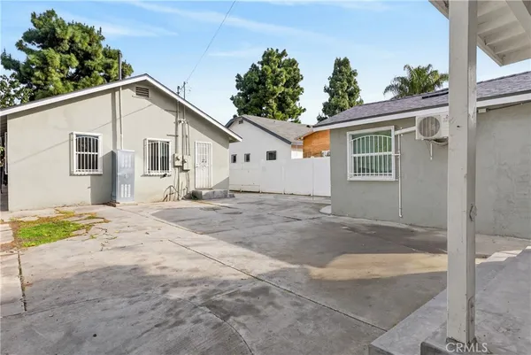a view of a backyard of a house