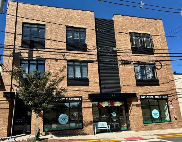 a front view of a building with street