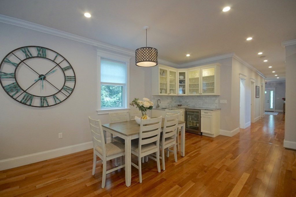 13 Warren Street Needham, MA 02492 - Photo 16 of 34 a view of a dining room with furniture window and wooden floor