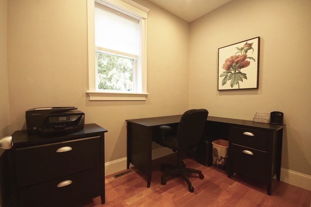 13 Warren Street Needham, MA 02492 - Photo 18 of 34 a view of a workspace with furniture and a window