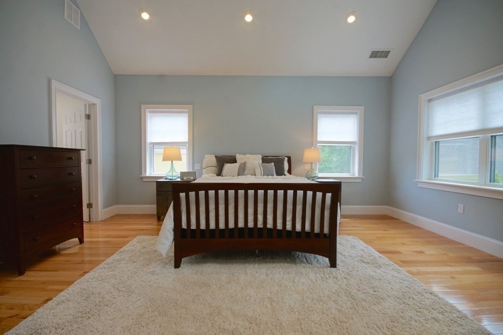 13 Warren Street Needham, MA 02492 - Photo 21 of 34 a bedroom with a bed and window