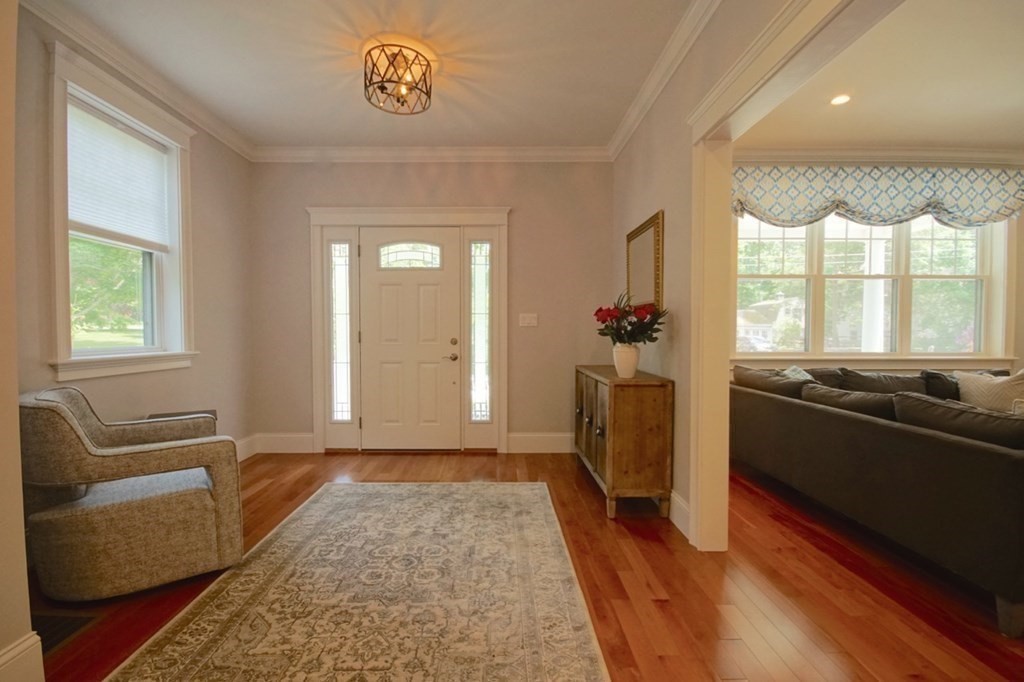 13 Warren Street Needham, MA 02492 - Photo 3 of 34 a view of a living room and a window