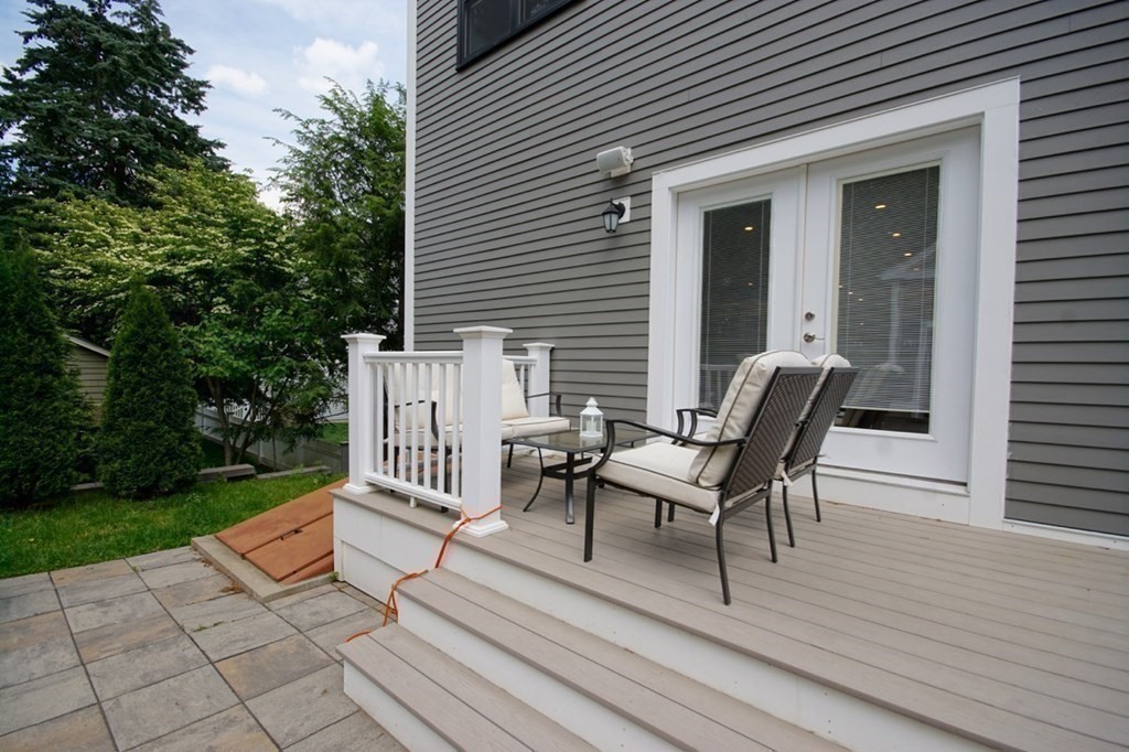 13 Warren Street Needham, MA 02492 - Photo 33 of 34 a view of a chair and tables in the patio