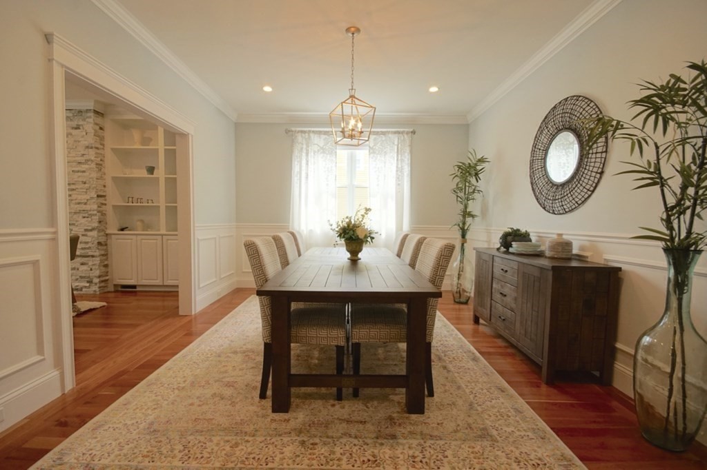 13 Warren Street Needham, MA 02492 - Photo 8 of 34 a view of a dining room with furniture window and wooden floor
