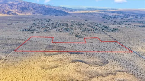a view of a backyard of a house