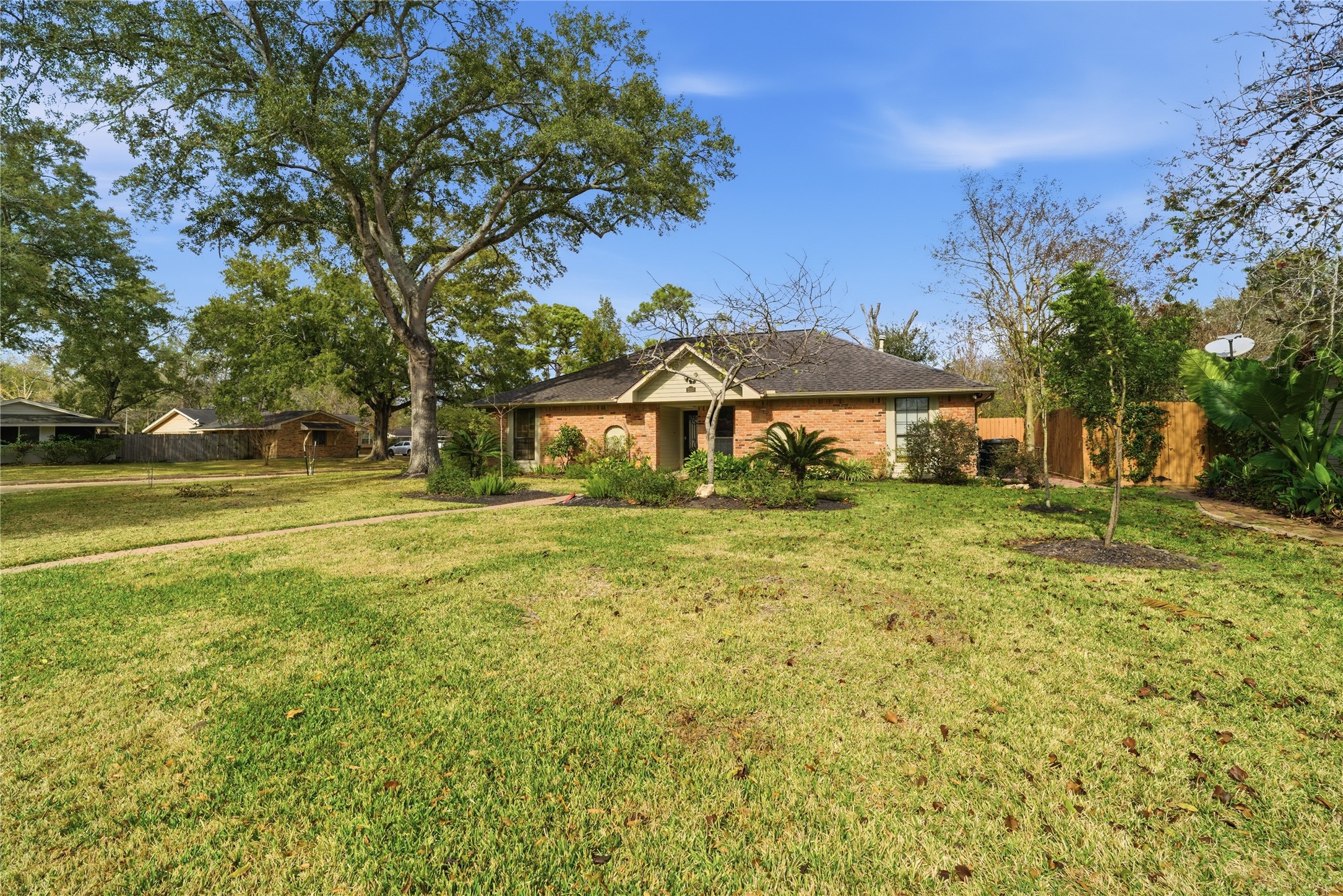 2003 Richvale Lane Houston, TX 77062 - Photo 2 of 29 a front view of a house with a yard