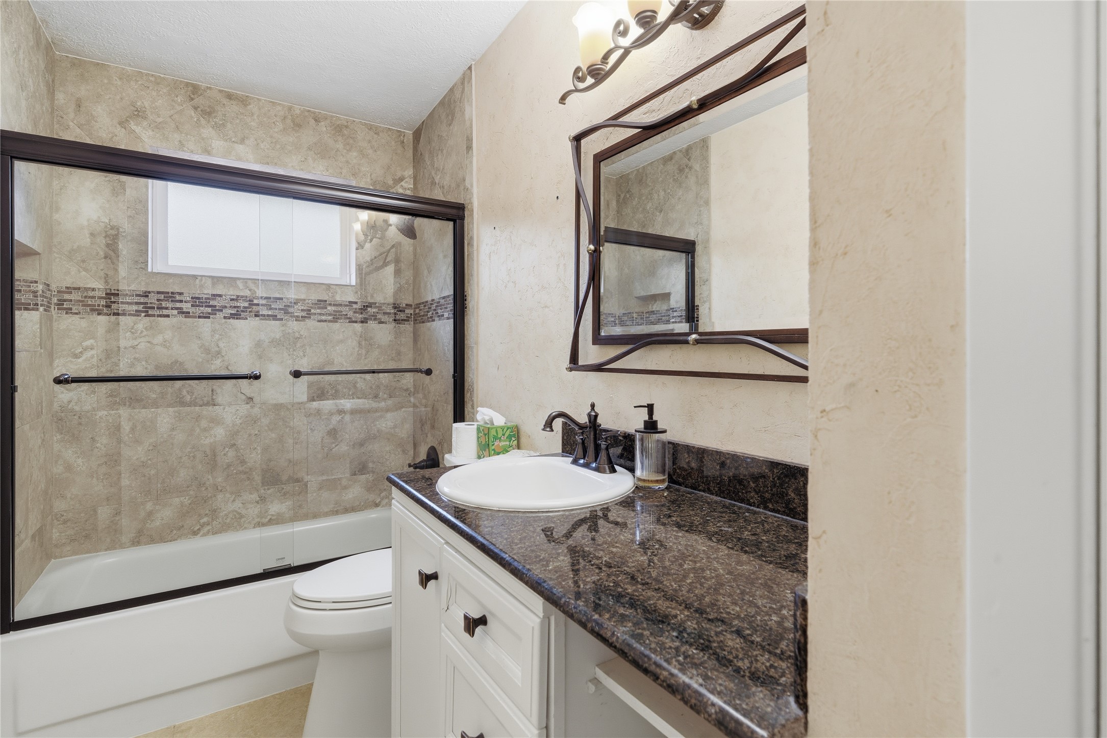 2003 Richvale Lane Houston, TX 77062 - Photo 21 of 29 a bathroom with a granite countertop sink mirror vanity and toilet