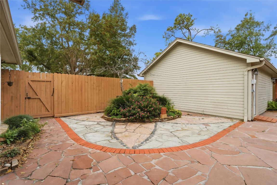 2003 Richvale Lane Houston, TX 77062 - Photo 23 of 29 a view of a house with backyard