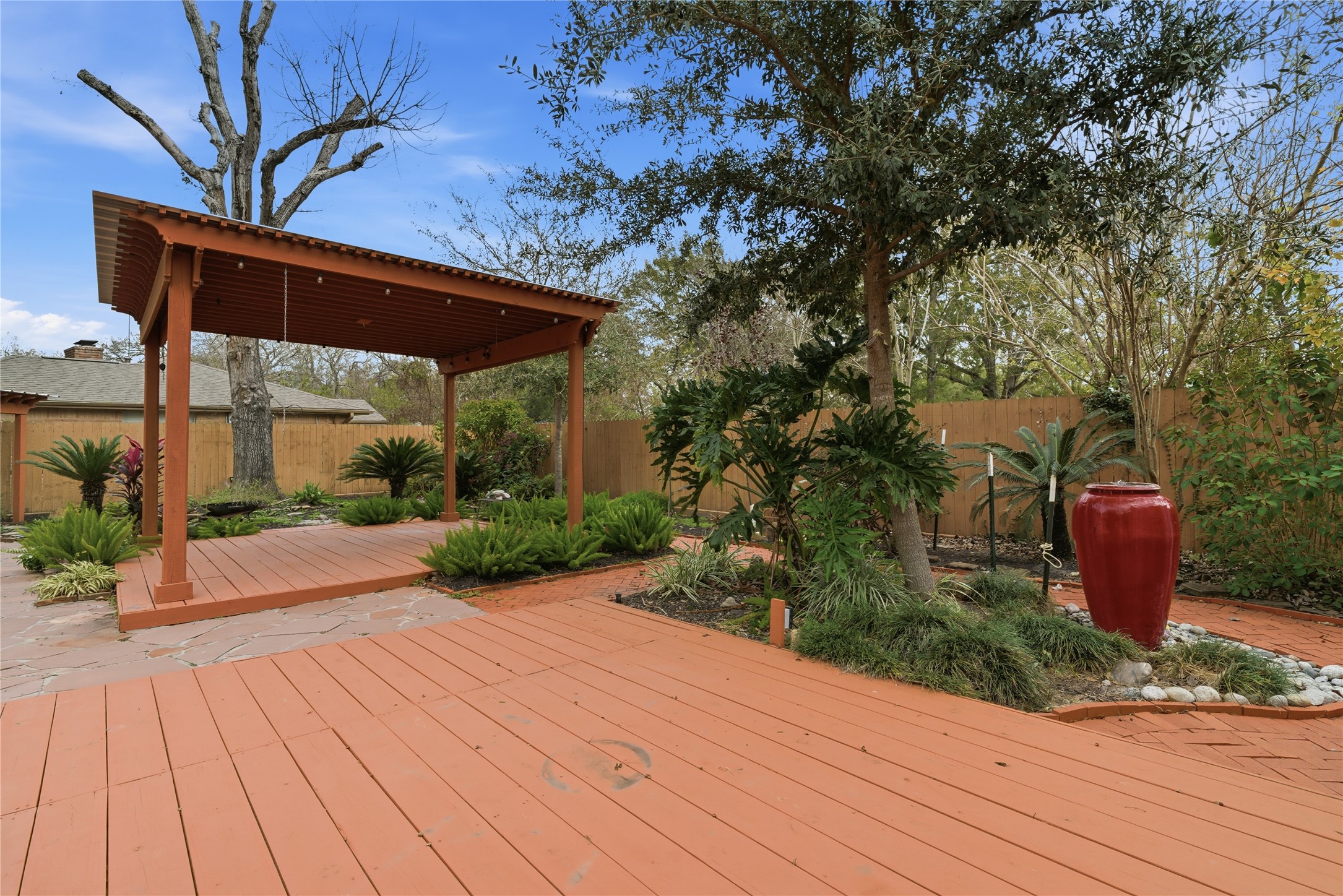 2003 Richvale Lane Houston, TX 77062 - Photo 24 of 29 a view of a backyard with potted plants
