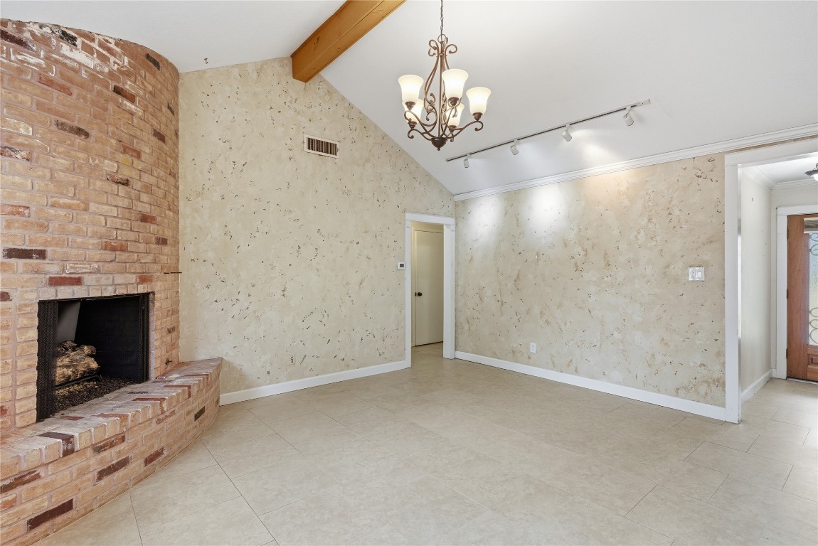 2003 Richvale Lane Houston, TX 77062 - Photo 5 of 29 wooden floor in an empty room with a fireplace
