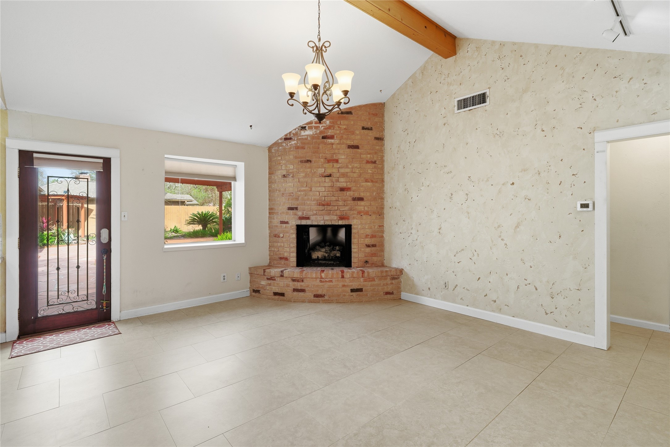 2003 Richvale Lane Houston, TX 77062 - Photo 6 of 29 an empty room with windows and fireplace