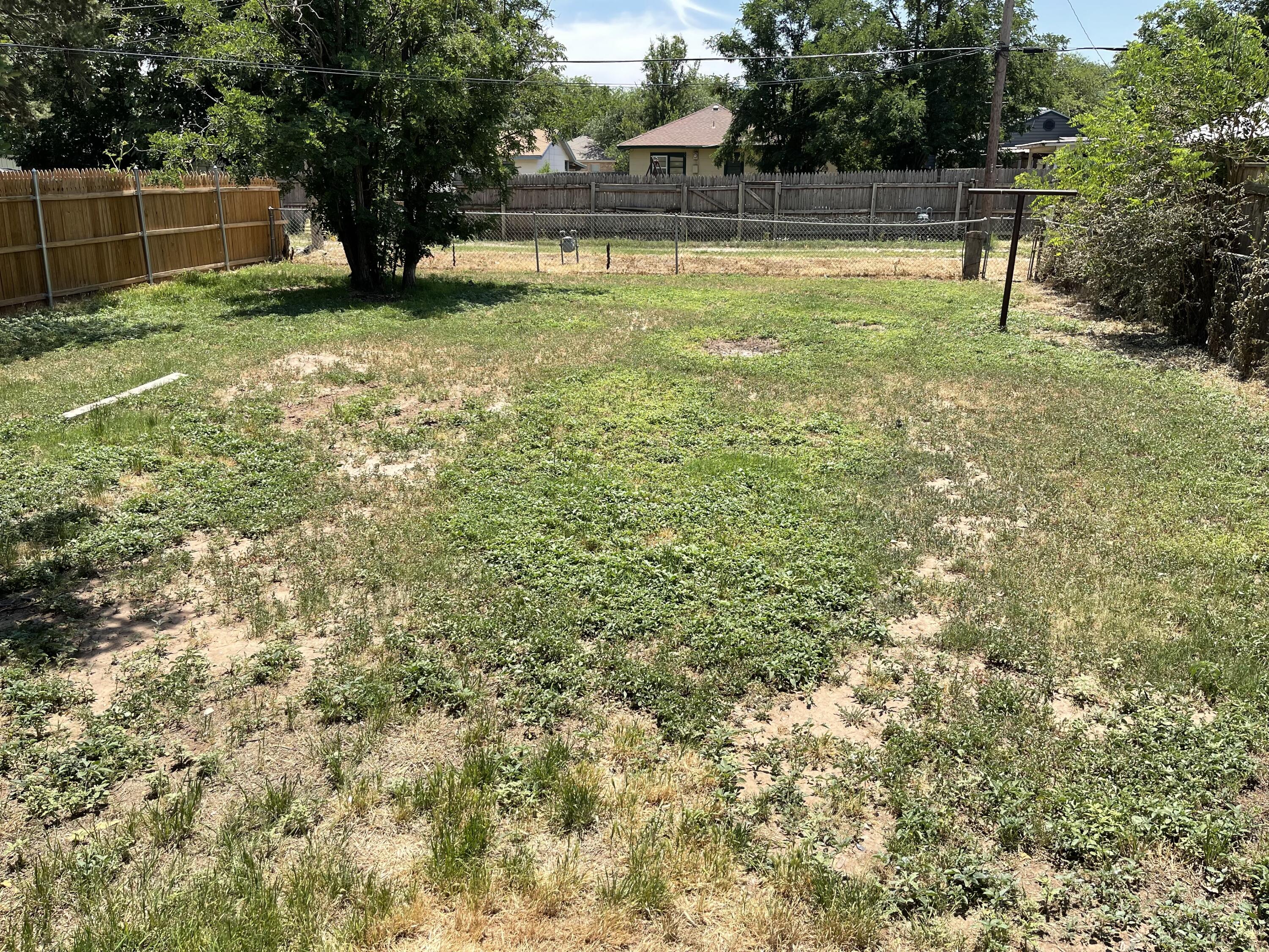 4813 37th Street Lubbock, TX 79414 - Photo 12 of 12 a view of a backyard with a garden
