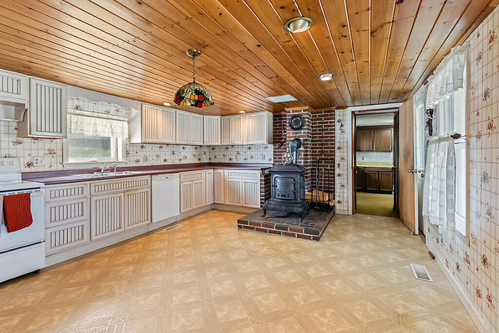 205 Bangor Road Unity, ME 04988 - Photo 10 of 33 Wood Stove & Kitchen