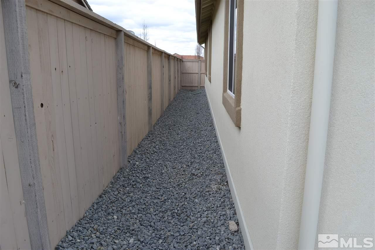 10790 Ridgebrook Drive Reno, NV 89521 - Photo 16 of 16 a view of a pathway gate with a hallway