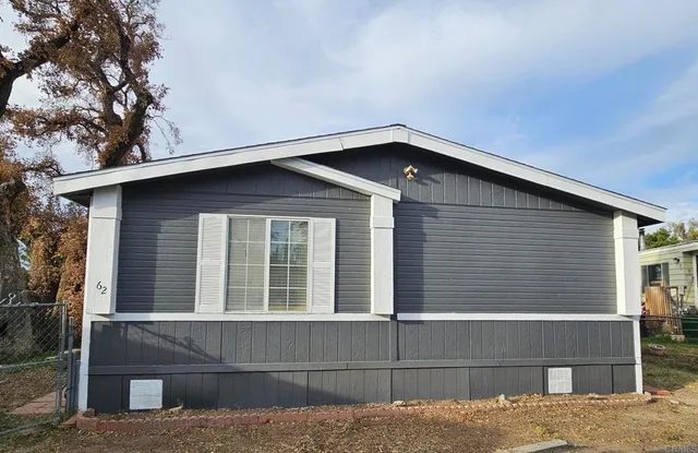 a front view of a house with a garage