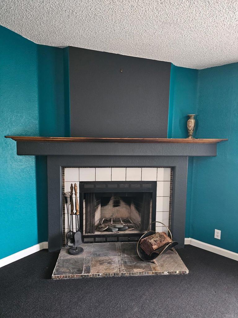 26455 Paradise Valley Road, Unit 62 Warner Springs, CA 92086 - Photo 11 of 19 a living room with a fireplace