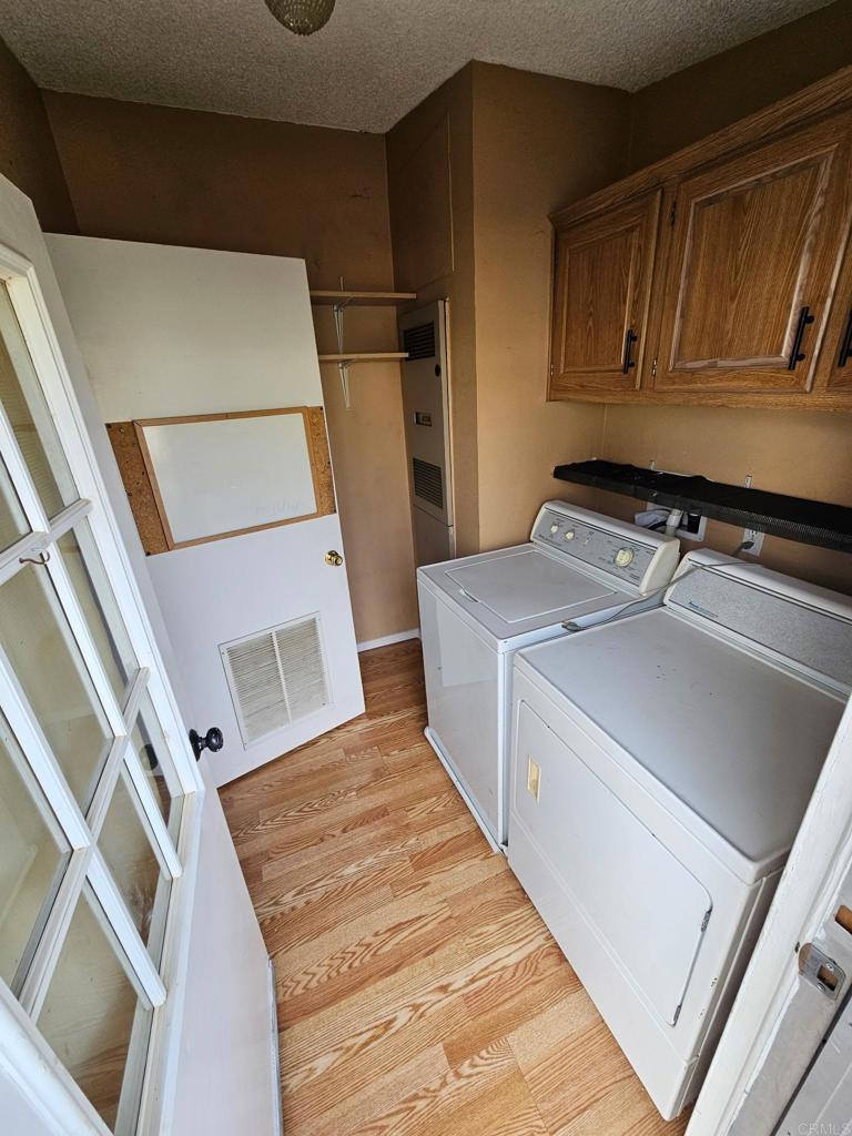 26455 Paradise Valley Road, Unit 62 Warner Springs, CA 92086 - Photo 13 of 19 a utility room with dryer and washer