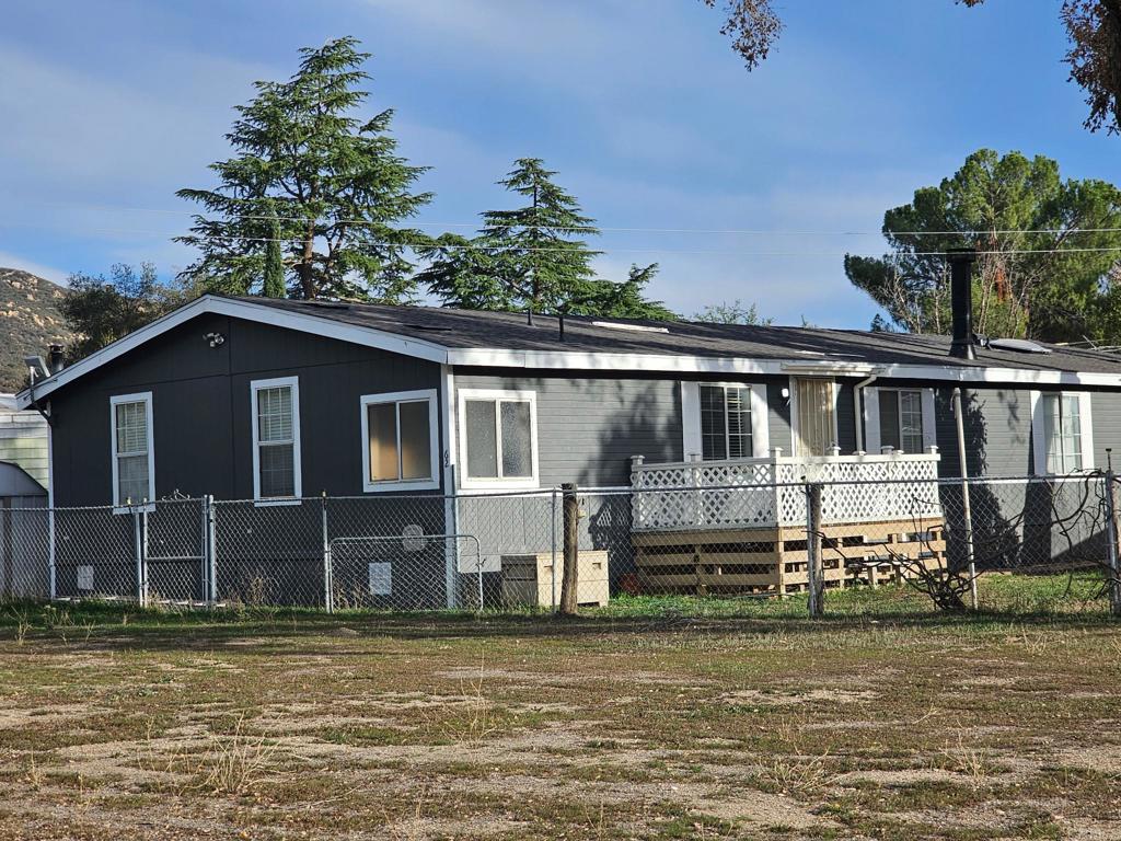 26455 Paradise Valley Road, Unit 62 Warner Springs, CA 92086 - Photo 2 of 19 a house that has a large pool in front of it