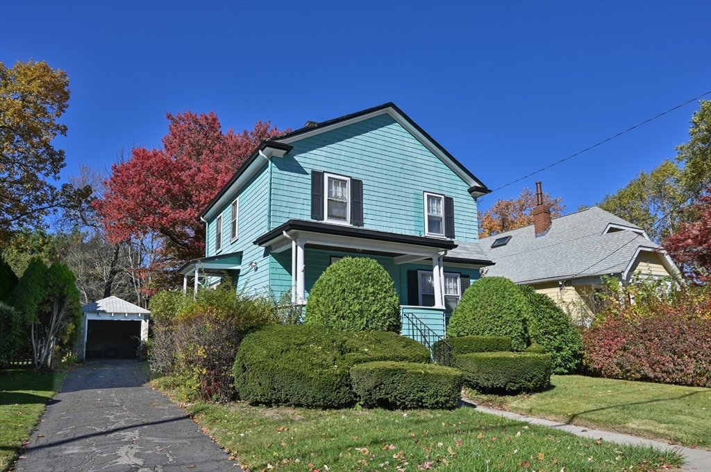 73 Woodard Road Boston, MA 02132 - Photo 12 of 20 a front view of a house with a yard