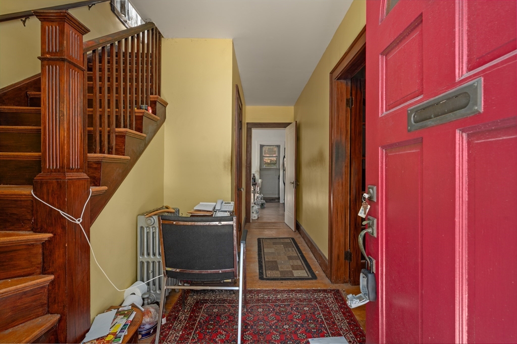 73 Woodard Road Boston, MA 02132 - Photo 3 of 20 a view of a balcony with furniture