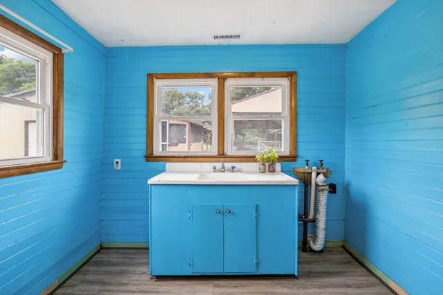 a view of a backyard with sitting area