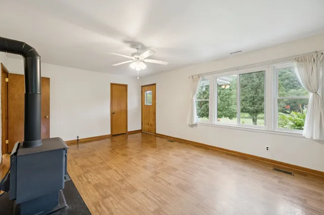 a view of a lake with green space