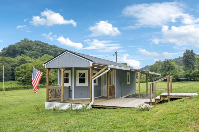 a view of lake with green space