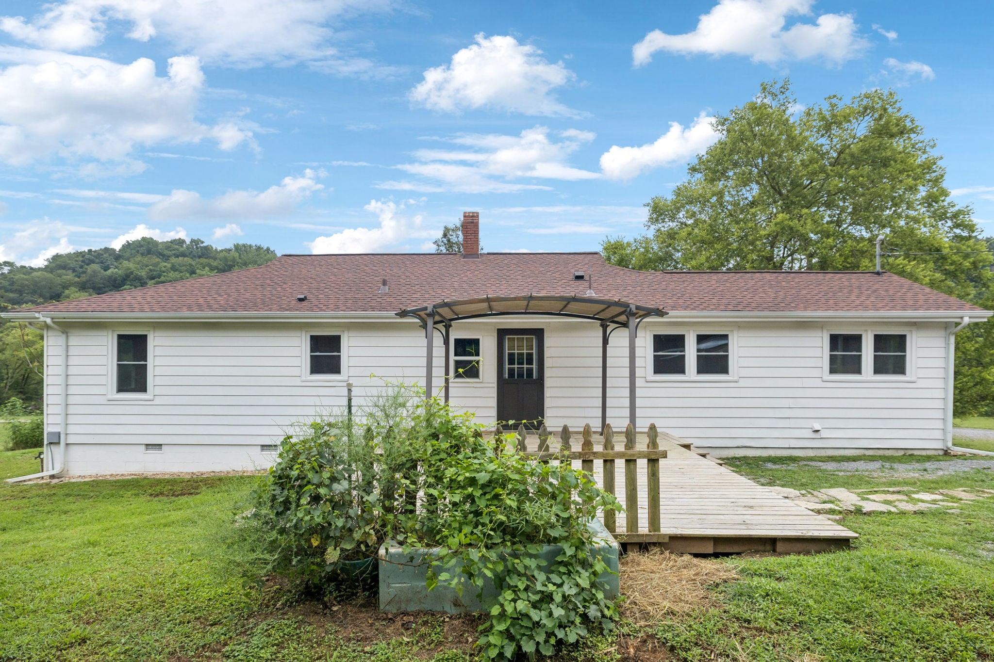 994 Bull Run Road Lynchburg, TN 37352 - Photo 42 of 76 a view of a house with a yard