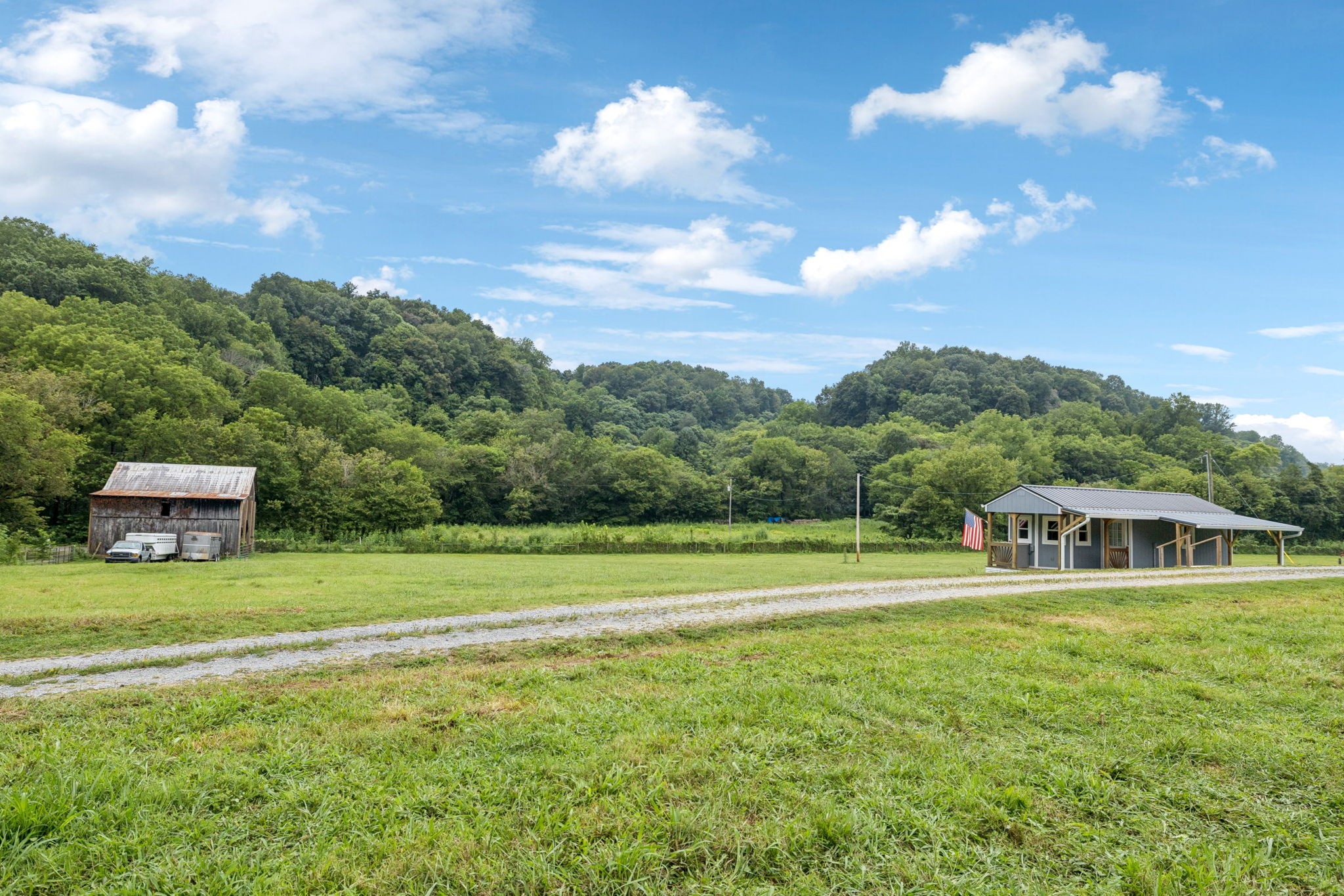 994 Bull Run Road Lynchburg, TN 37352 - Photo 8 of 76 a swimming pool with trees in the background