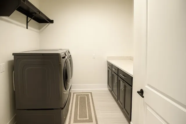 a bathroom with a glass shower door