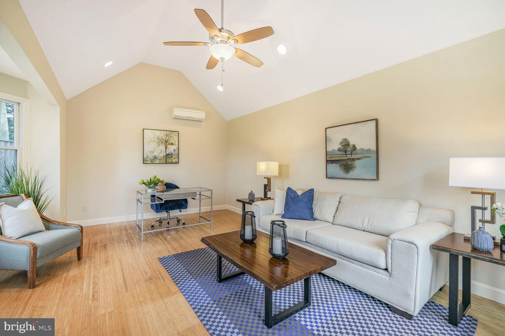 9213 Bradford Road Silver Spring, MD 20901 - Photo 5 of 34 a living room with furniture or couch and a potted plant