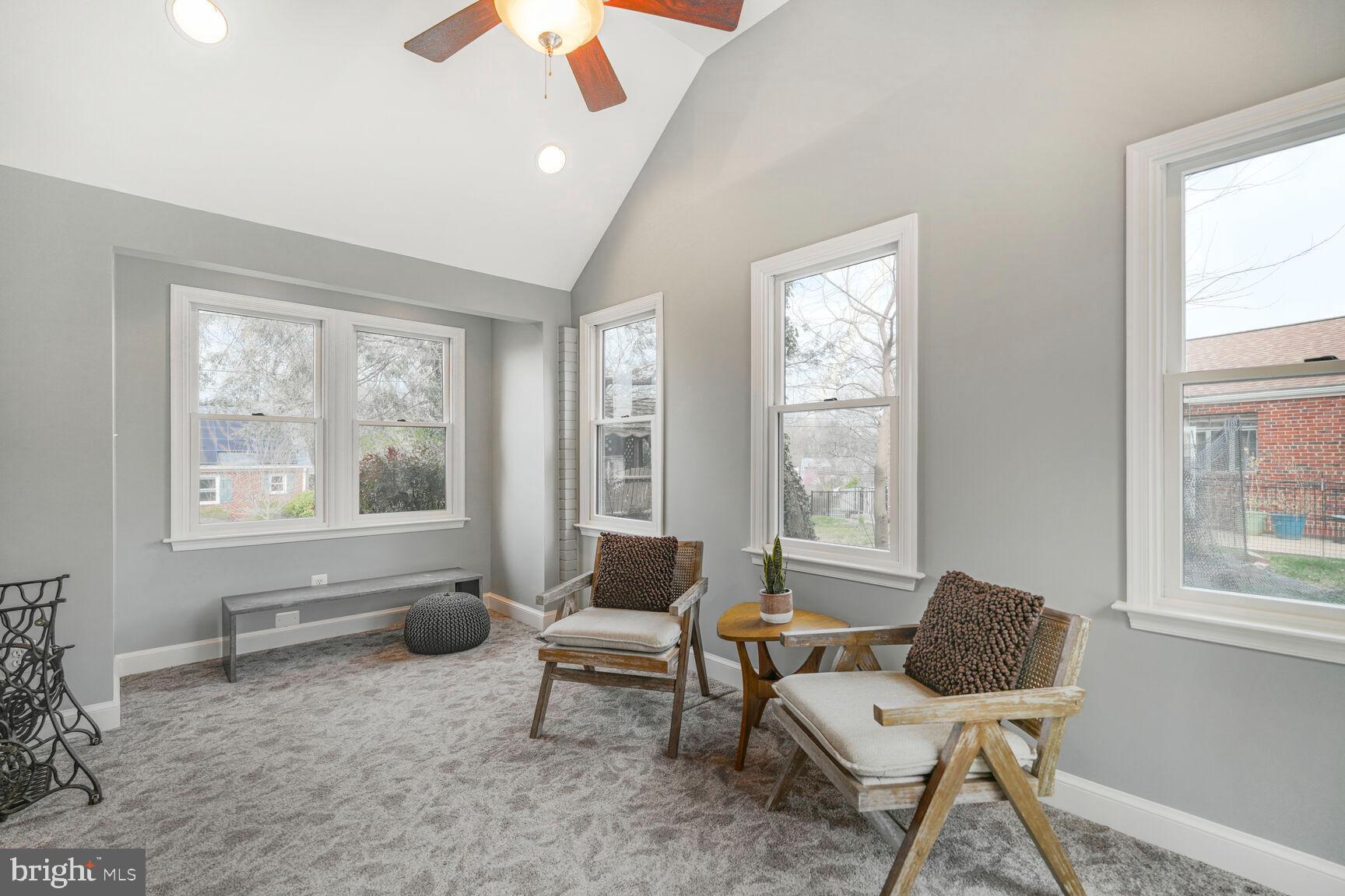 9213 Bradford Road Silver Spring, MD 20901 - Photo 9 of 34 a living room with furniture and a window