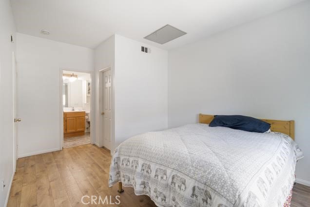 624 Corte Patio, Unit 81 Chula Vista, CA 91914 - Photo 15 of 35 a bedroom with a bed and a walk in closet